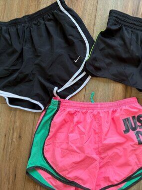 Bundle of 3 ladies running shorts Nike Dri-Fit size medium pink black